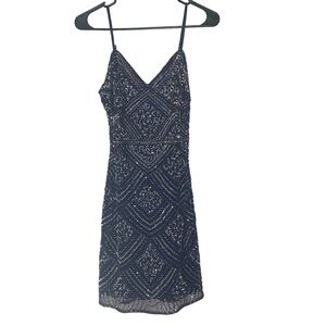 Jump apparel navy blue sequin dress, v neck, sleeveless, above the knee.